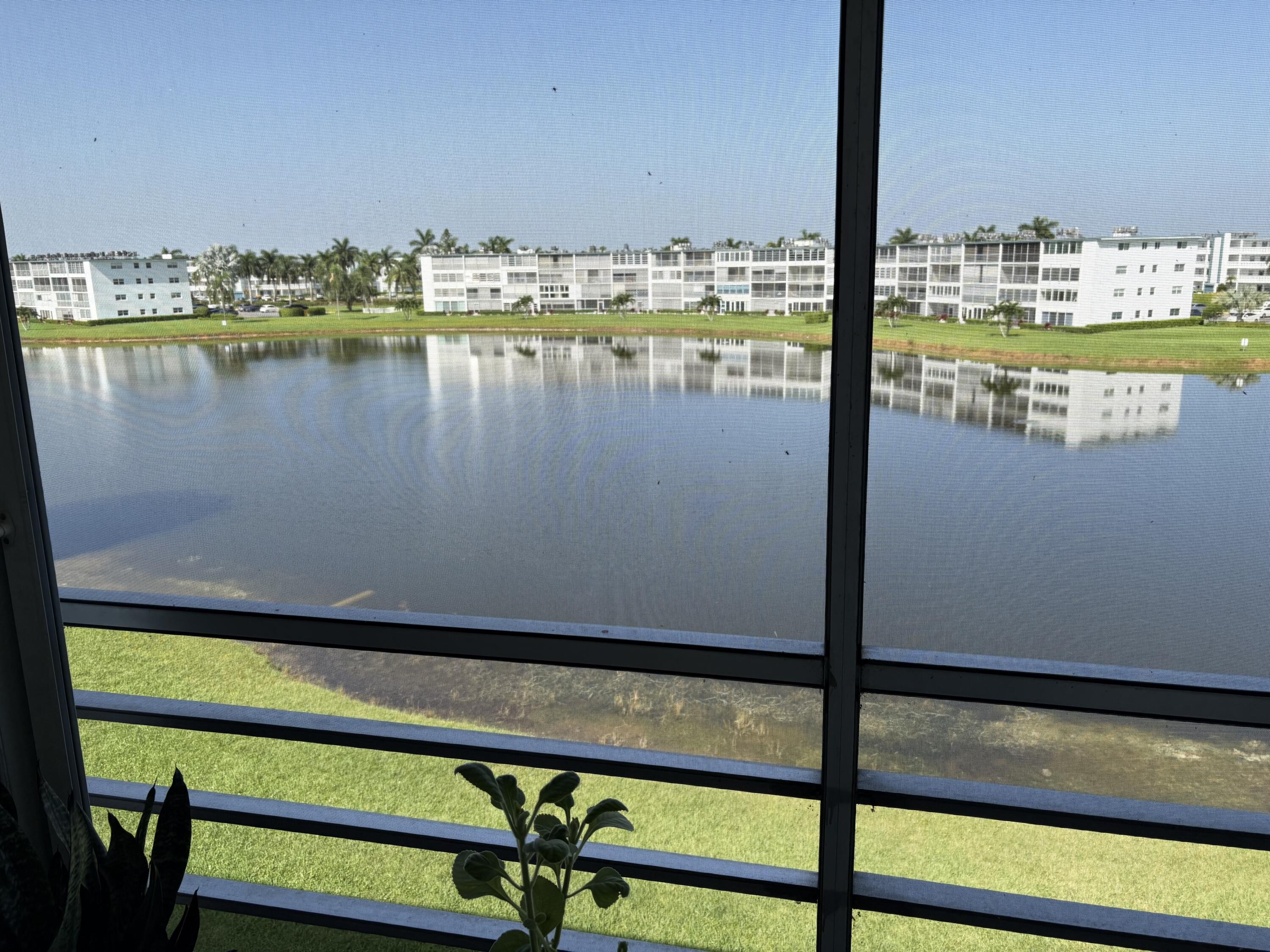 4070 Guildford East Boca Raton, FL 33434 - Photo 21 of 22 WATER VIEW FROM PATIO