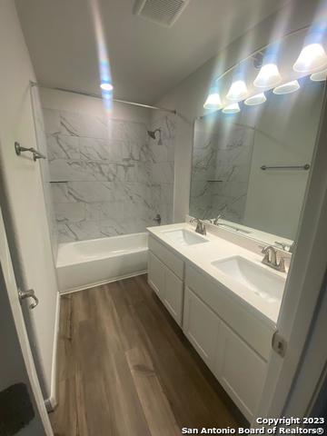 8338 Morningside Place Selma, TX 78154 - Photo 8 of 8 a bathroom with a sink a toilet and shower