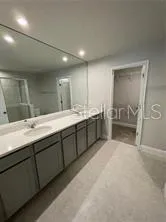 a close view of a sink and a toilet