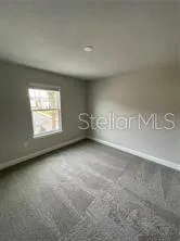 a bathroom with a toilet a sink and shower