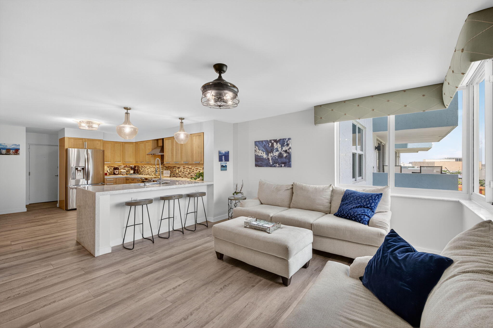 777 Bayshore Drive, Unit 1003 Fort Lauderdale, FL 33304 - Photo 13 of 49 a living room with furniture and a wooden floor