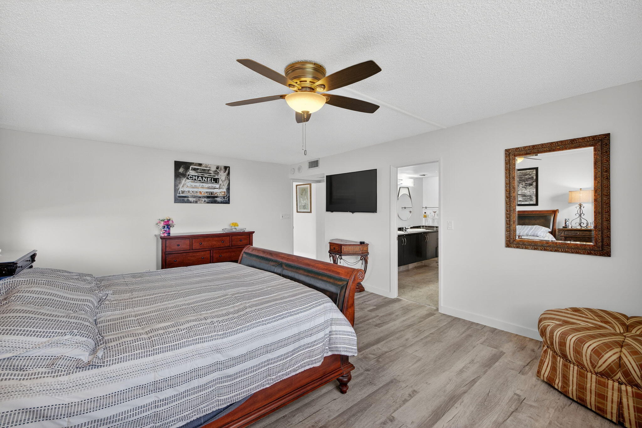 777 Bayshore Drive, Unit 1003 Fort Lauderdale, FL 33304 - Photo 18 of 49 a bedroom with a bed and a flat screen tv