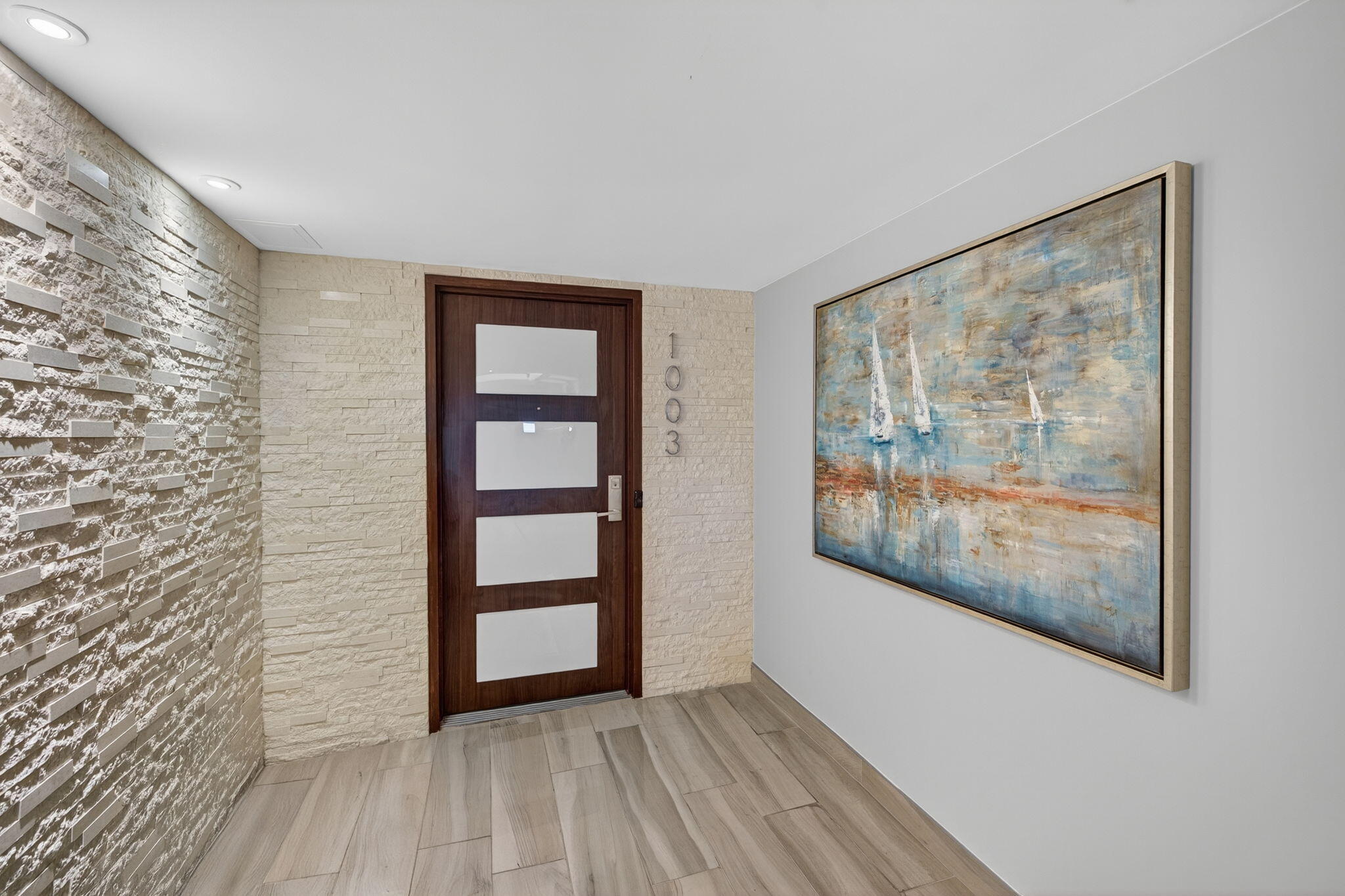 777 Bayshore Drive, Unit 1003 Fort Lauderdale, FL 33304 - Photo 7 of 49 wooden floor in an empty room with a window