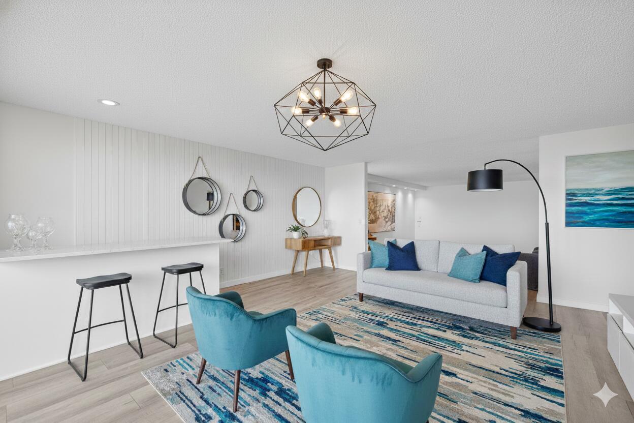 777 Bayshore Drive, Unit 1003 Fort Lauderdale, FL 33304 - Photo 10 of 49 a living room with furniture and wooden floor