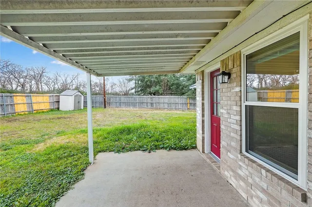 a view of a porch with a backyard