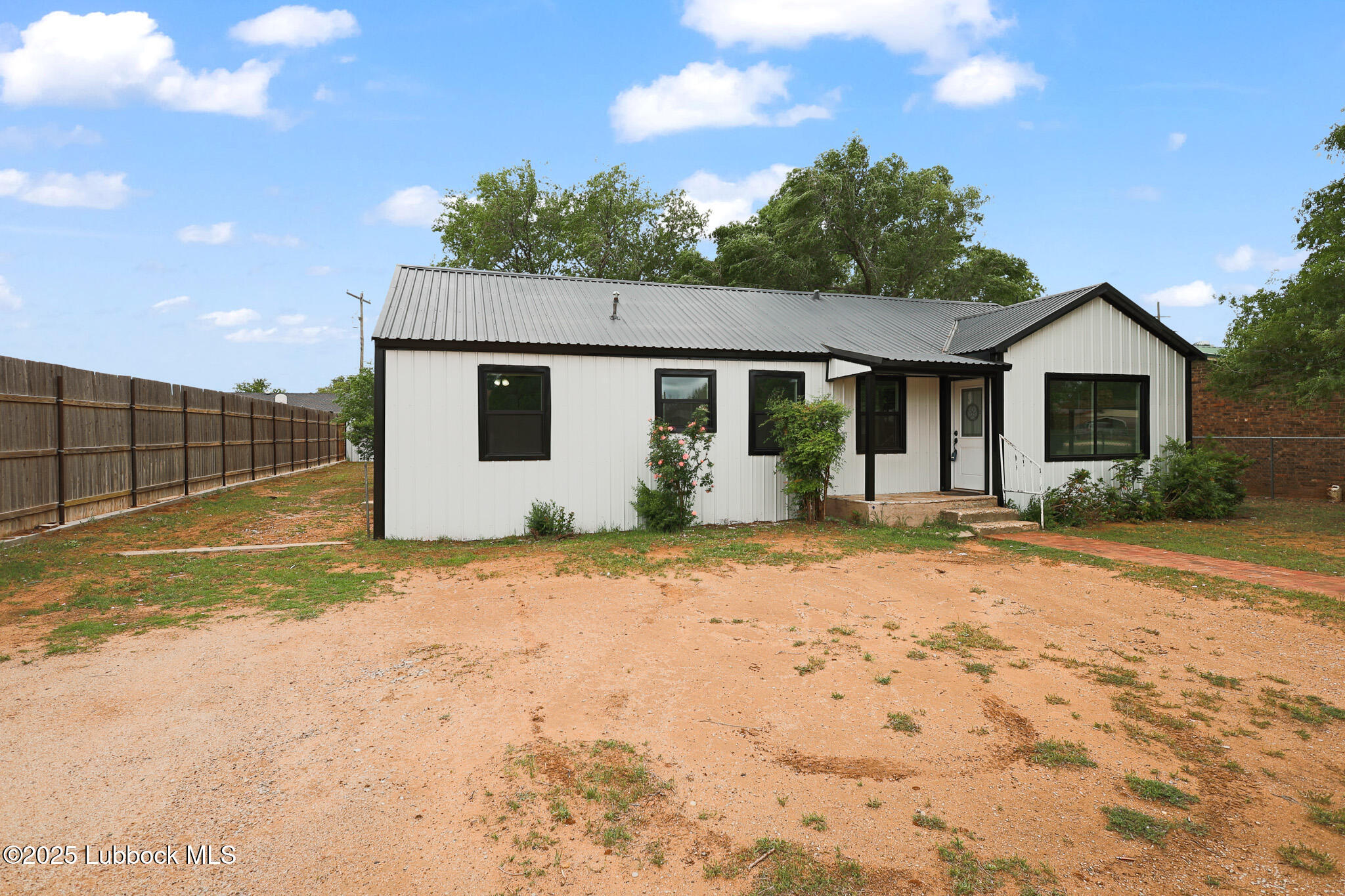204 Chestnut Street Ropesville, TX 79358 - Photo 2 of 42 a view of a house with backyard and garden