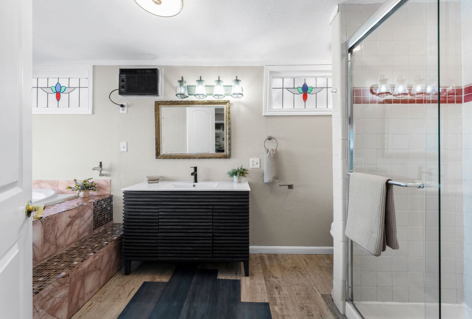 8124 Joy Road Volente, TX 78641 - Photo 13 of 31 a bathroom with a sink and a mirror