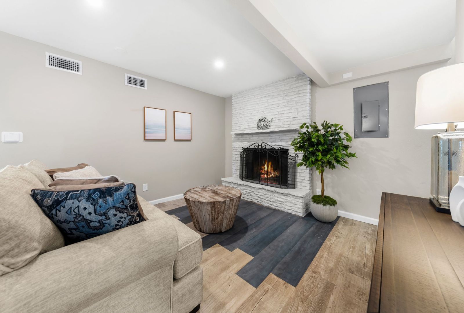 8124 Joy Road Volente, TX 78641 - Photo 15 of 31 a living room with furniture and a fireplace