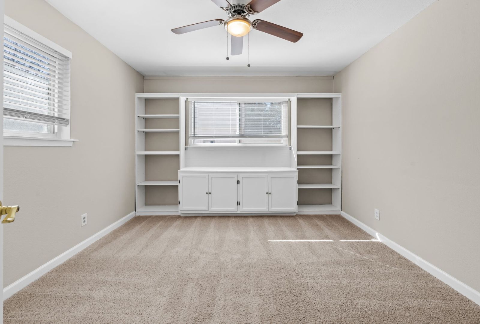 8124 Joy Road Volente, TX 78641 - Photo 17 of 31 a view of an empty room with a window