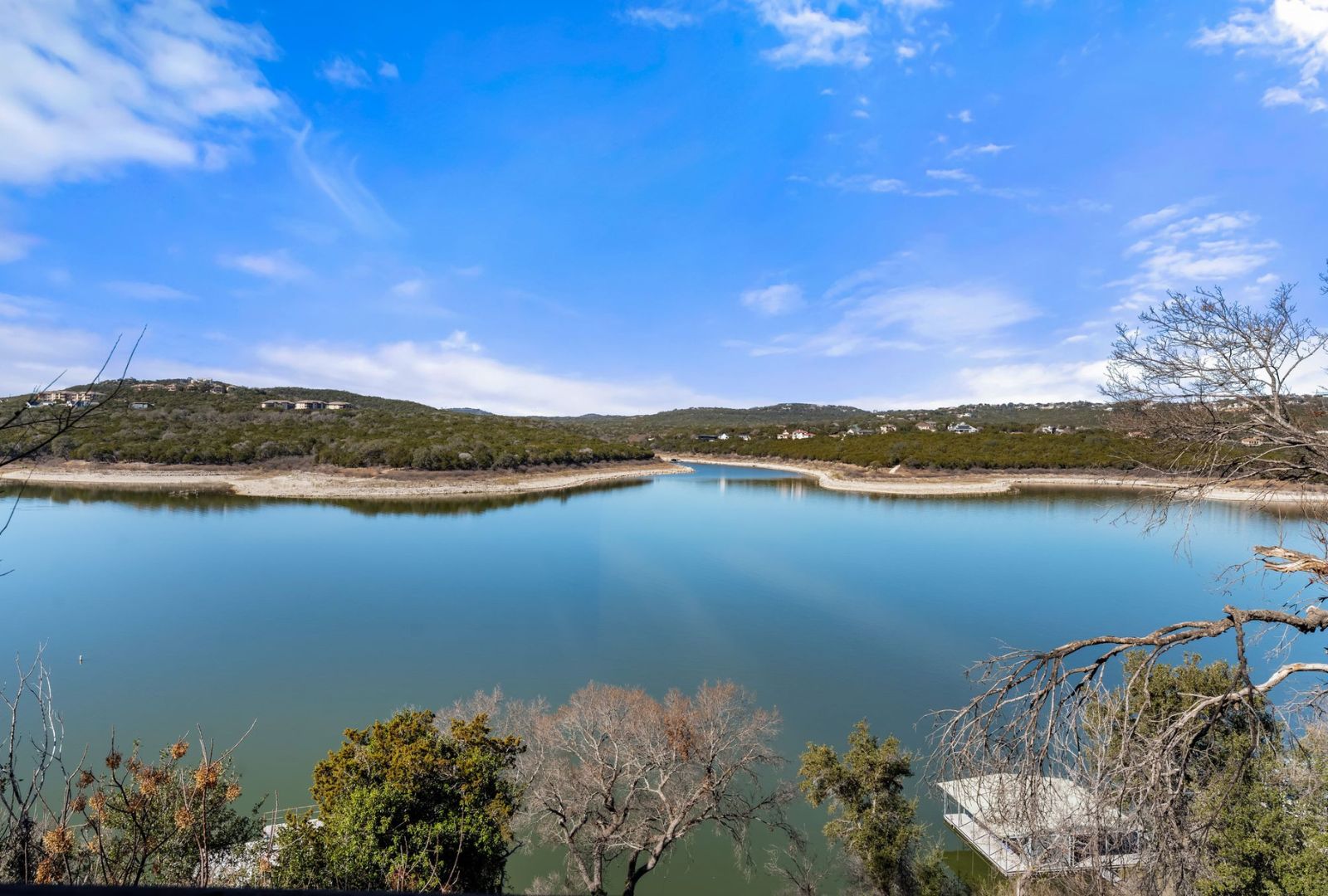 8124 Joy Road Volente, TX 78641 - Photo 18 of 31 a view of a lake with a lake