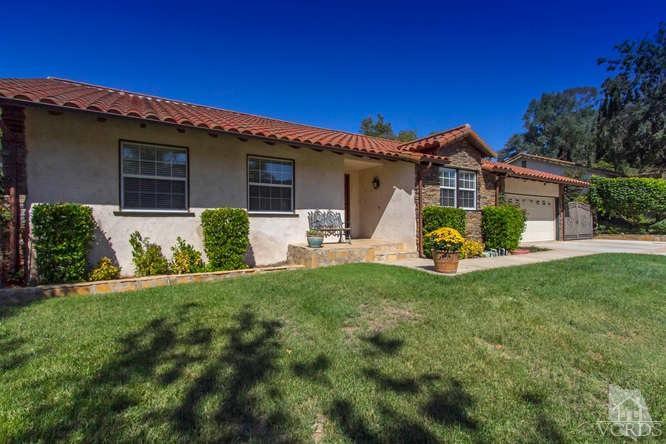 1321 Rambling Road Simi Valley, CA 93065 - Photo 3 of 42 a view of a house with a yard
