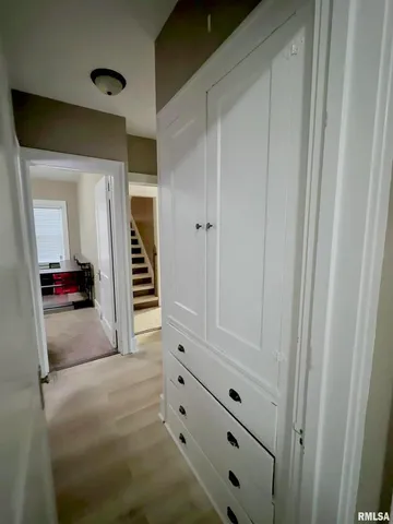 a living room with furniture and windows