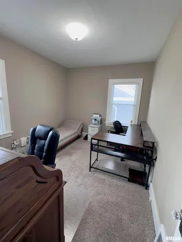 a room with furniture and a window