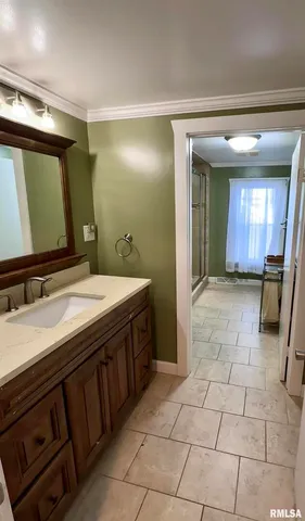 a view of room with window and front door