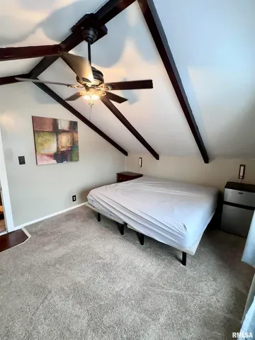 a view of livingroom with furniture and staircase