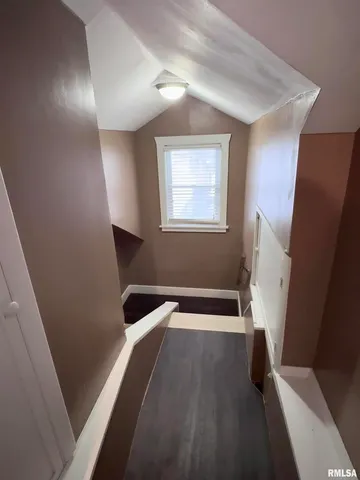 a view of a living room with furniture