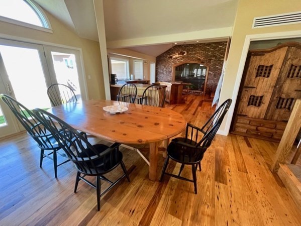 41 Naushon Road Aquinnah, MA 02535 - Photo 3 of 12 a view of a dining room with furniture and wooden floor