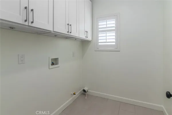 a view of cabinets and window