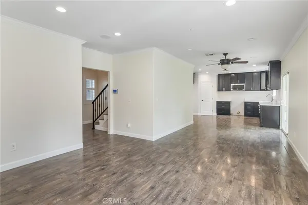 a view of a livingroom with a kitchen