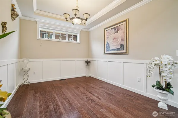 wooden floor in a empty room with a window