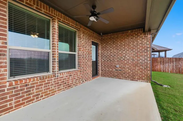 a view of a porch with wooden stairs