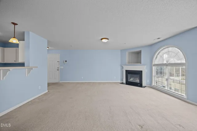 a kitchen with cabinets appliances and a counter space