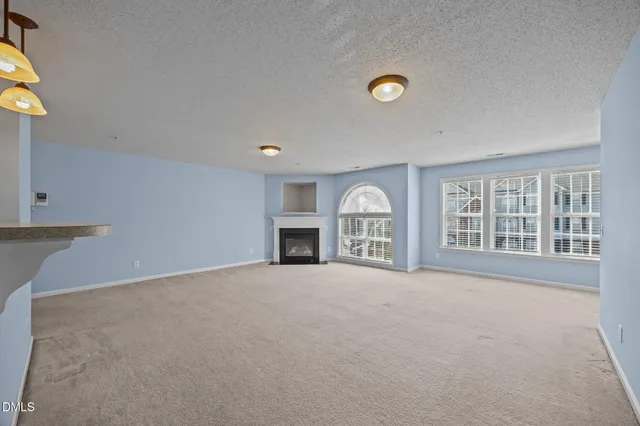 a bathroom with a bath tub with a shower