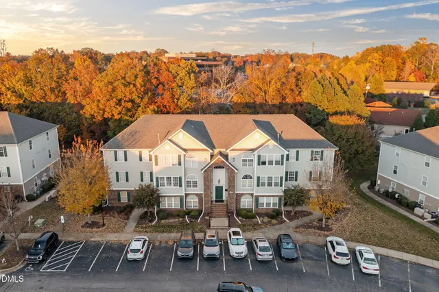 an aerial view of a city with lots of residential buildings