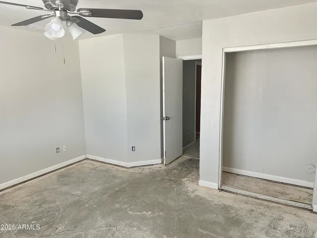 a kitchen with a stove and a white cabinet