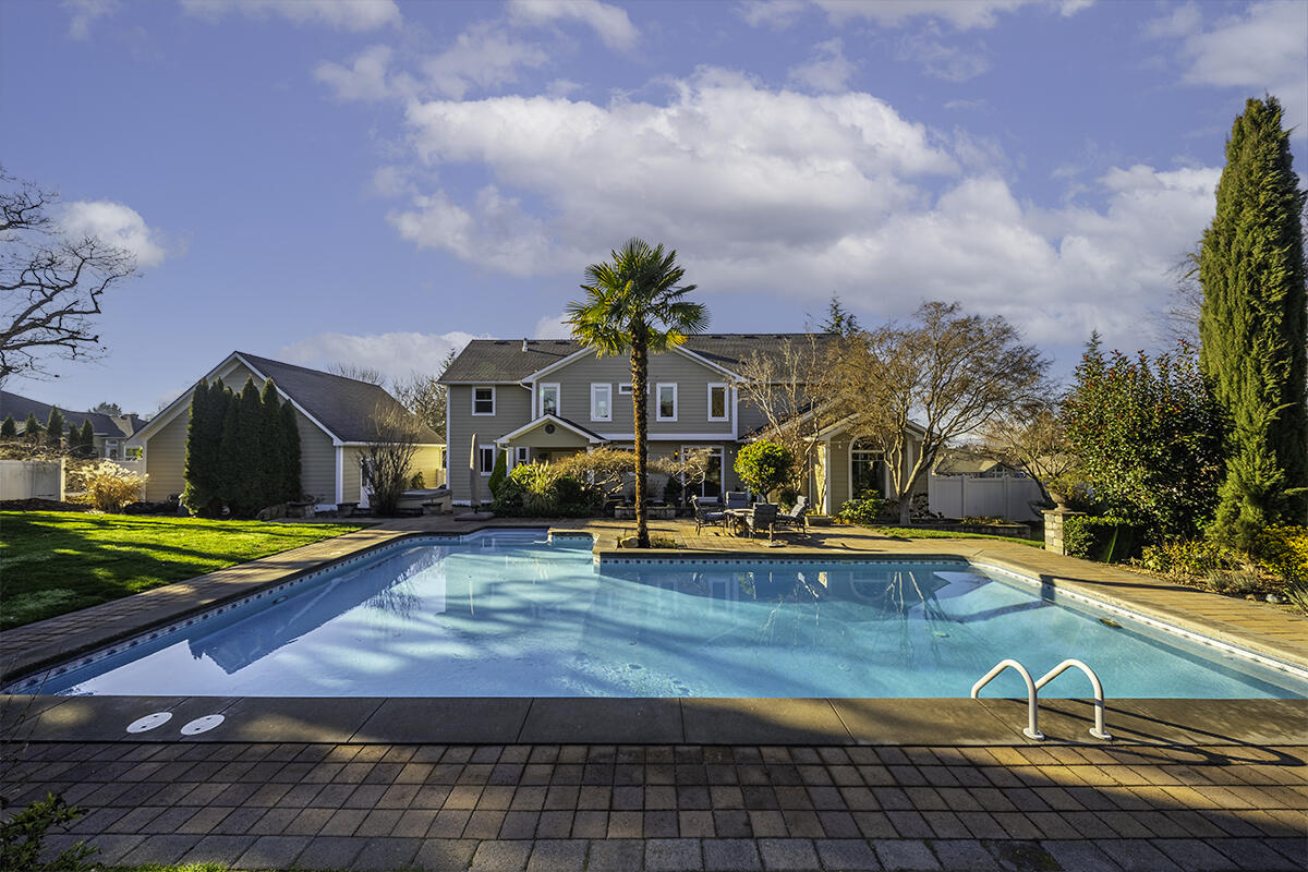 3343 Lone Pine Road Medford, OR 97504 - Photo 10 of 47 Rear Elevation Framed By the Saltwater Pool