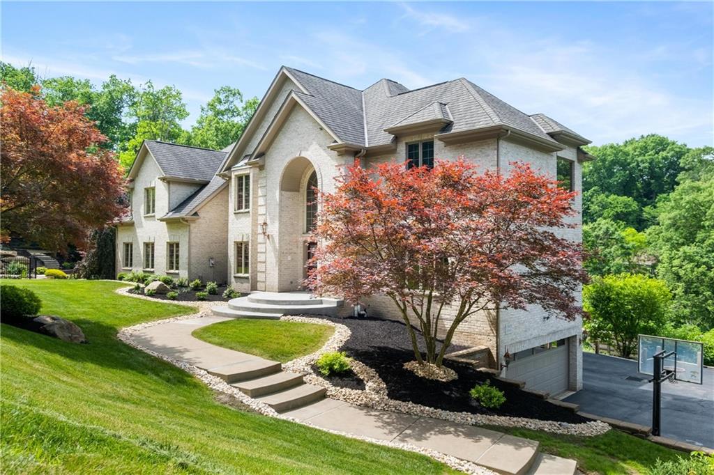 179 Goldsmith Road Pittsburgh, PA 15237 - Photo 2 of 50 a front view of a house with yard and green space