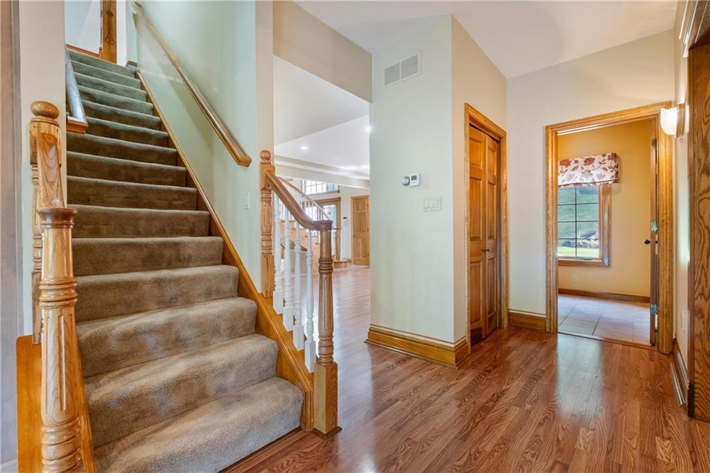 179 Goldsmith Road Pittsburgh, PA 15237 - Photo 21 of 50 a view of an entryway with wooden floor and door