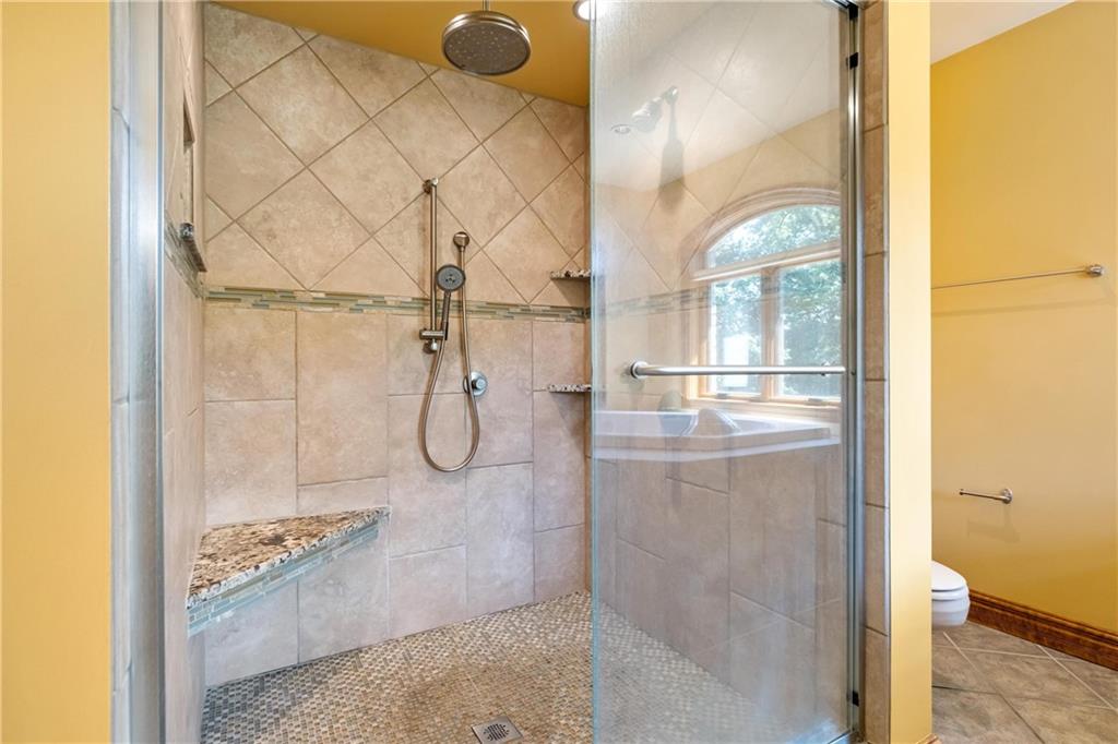 179 Goldsmith Road Pittsburgh, PA 15237 - Photo 38 of 50 a bathroom with a glass shower door