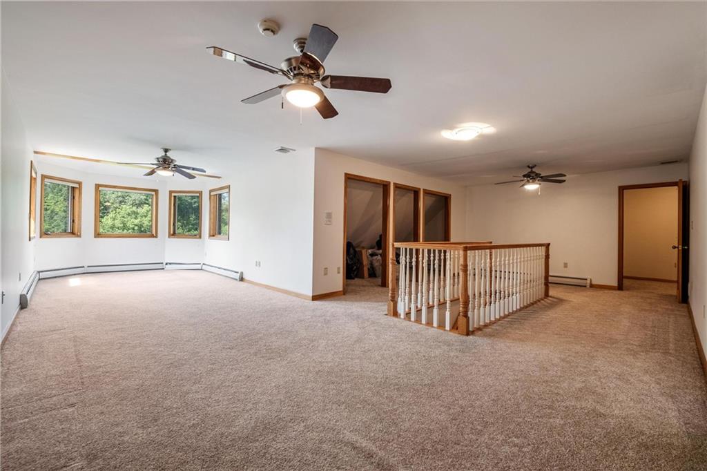 179 Goldsmith Road Pittsburgh, PA 15237 - Photo 40 of 50 a view of a livingroom with a ceiling fan and window