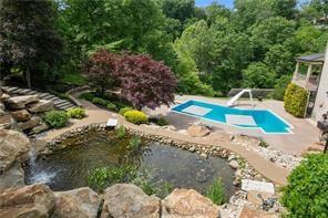 179 Goldsmith Road Pittsburgh, PA 15237 - Photo 50 of 50 a view of a backyard with plants and large trees