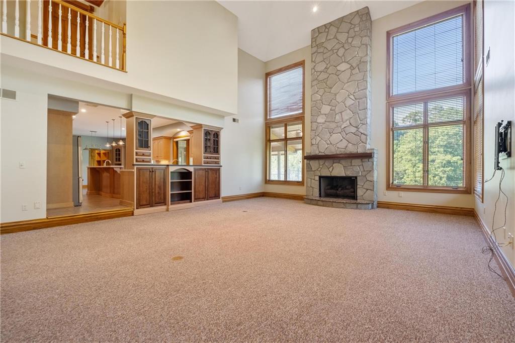 179 Goldsmith Road Pittsburgh, PA 15237 - Photo 9 of 50 an empty room with furniture and a fireplace