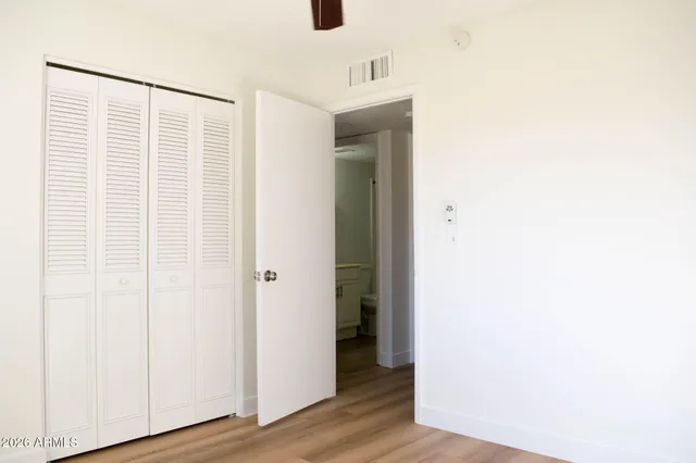 a view of a livingroom with wooden floor