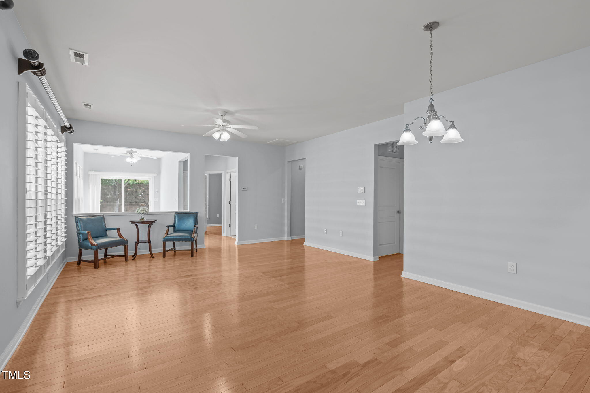 128 Arvind Oaks Circle Cary, NC 27519 - Photo 11 of 34 a view of a dining room with furniture and chandelier