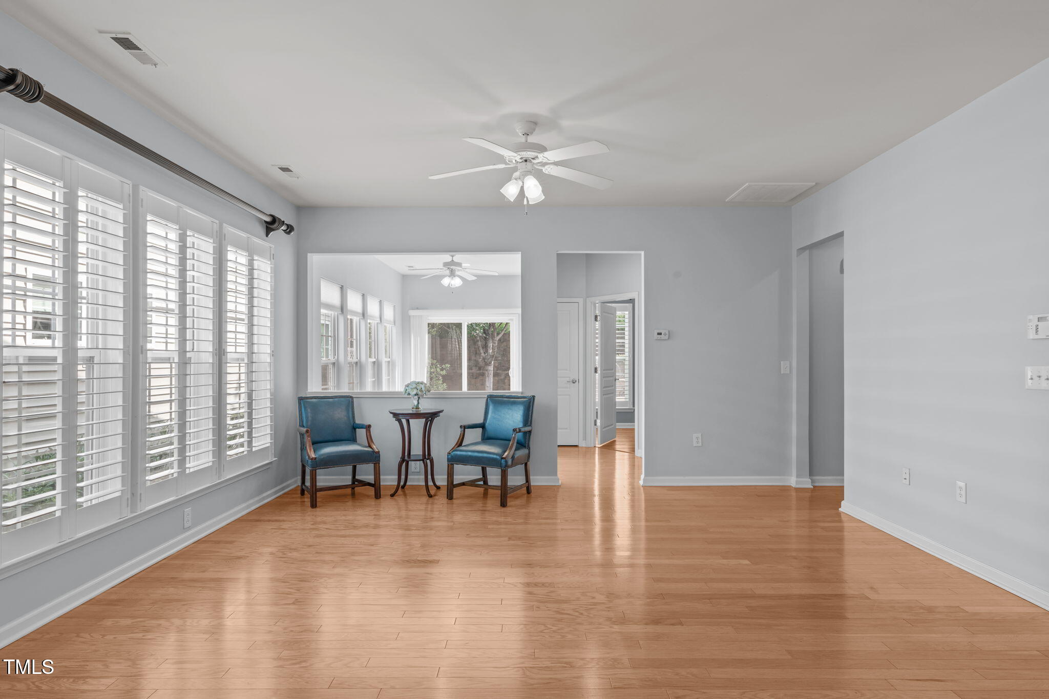 128 Arvind Oaks Circle Cary, NC 27519 - Photo 13 of 34 a view of a dining room with furniture window and wooden floor