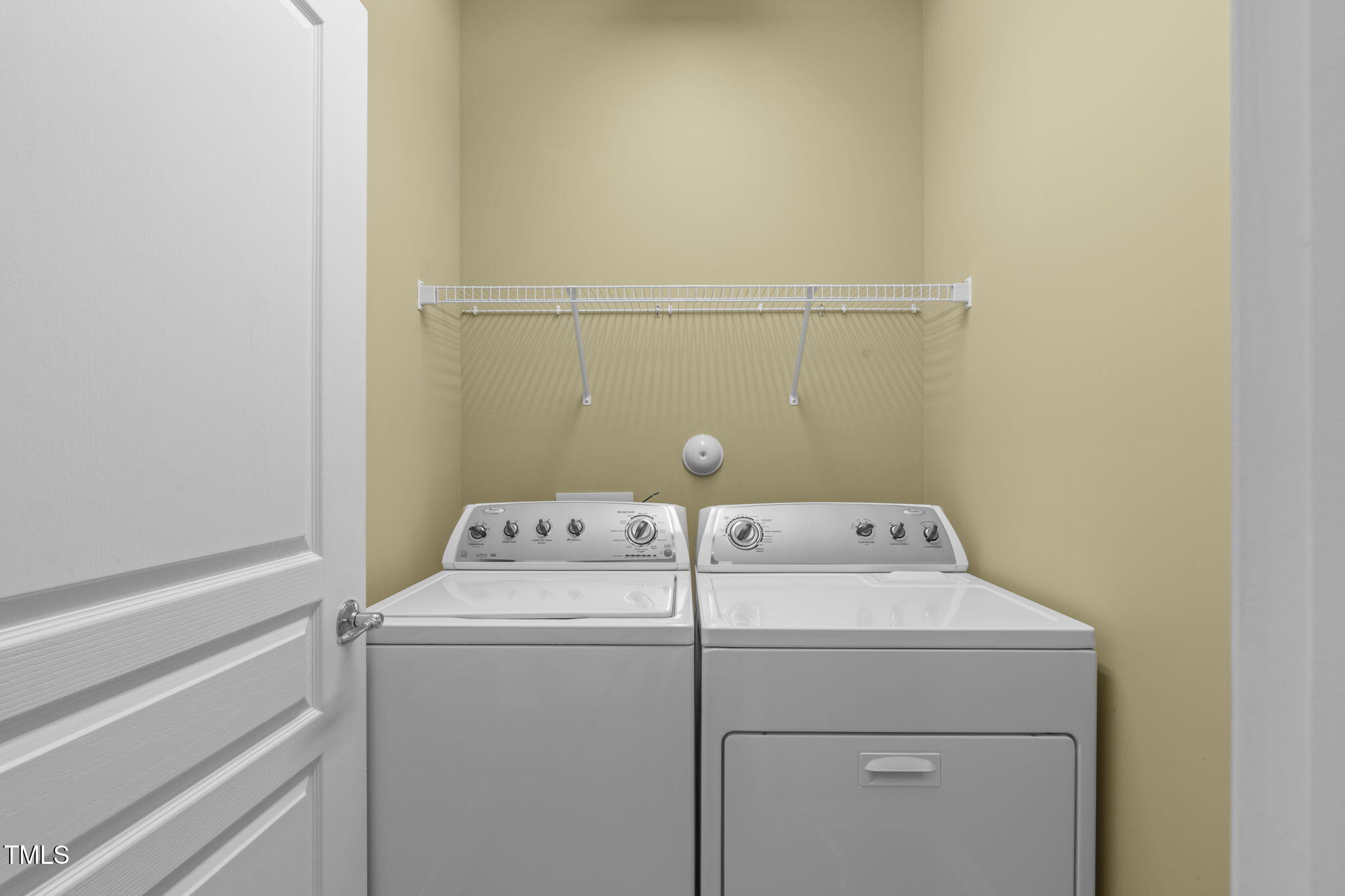 128 Arvind Oaks Circle Cary, NC 27519 - Photo 20 of 34 a utility room with dryer and washer
