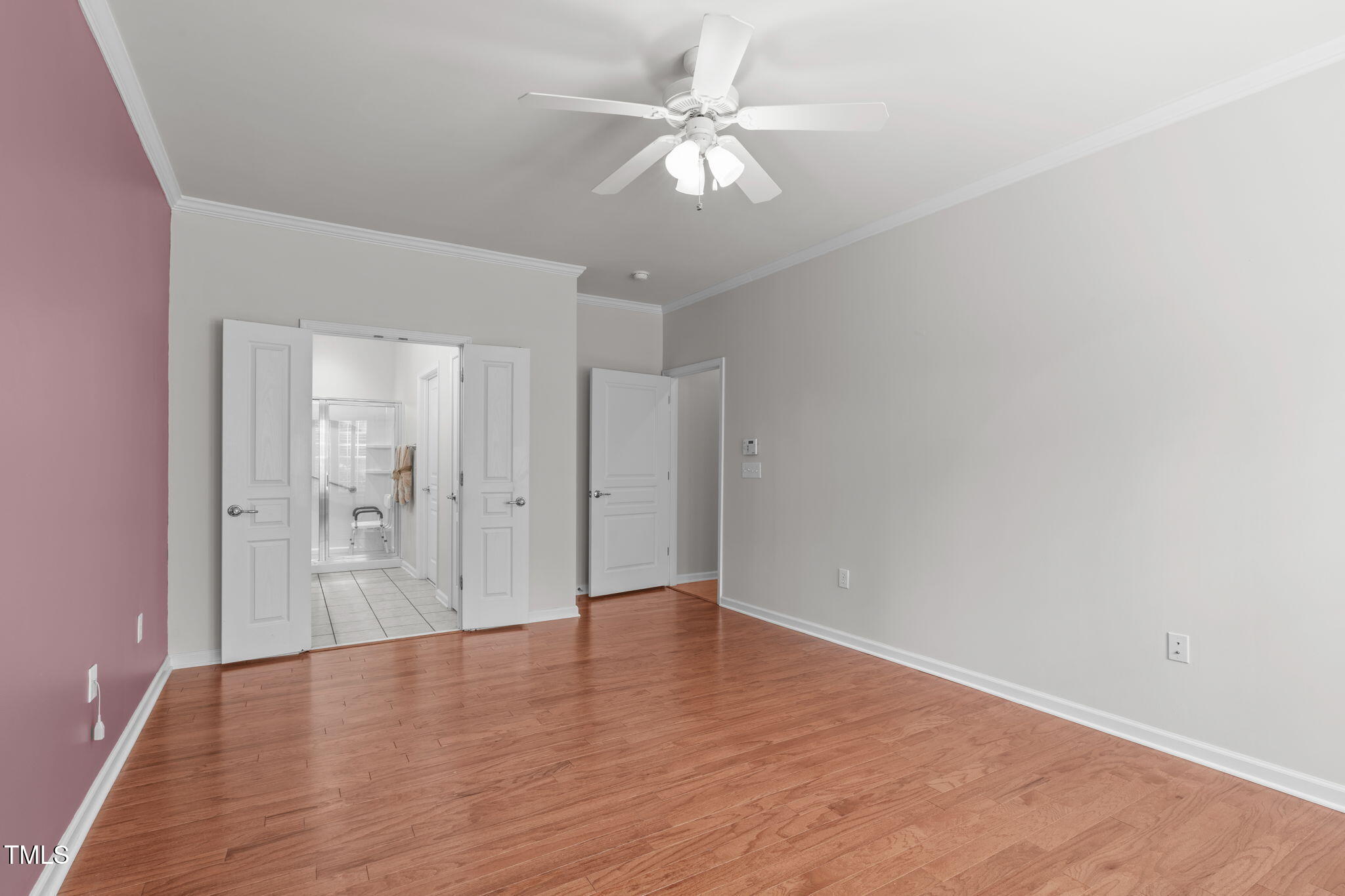 128 Arvind Oaks Circle Cary, NC 27519 - Photo 22 of 34 a view of an empty room with wooden floor
