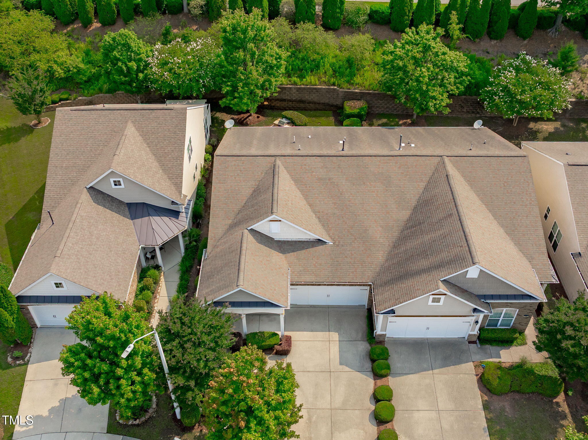 128 Arvind Oaks Circle Cary, NC 27519 - Photo 26 of 34 an aerial view of a house with a yard