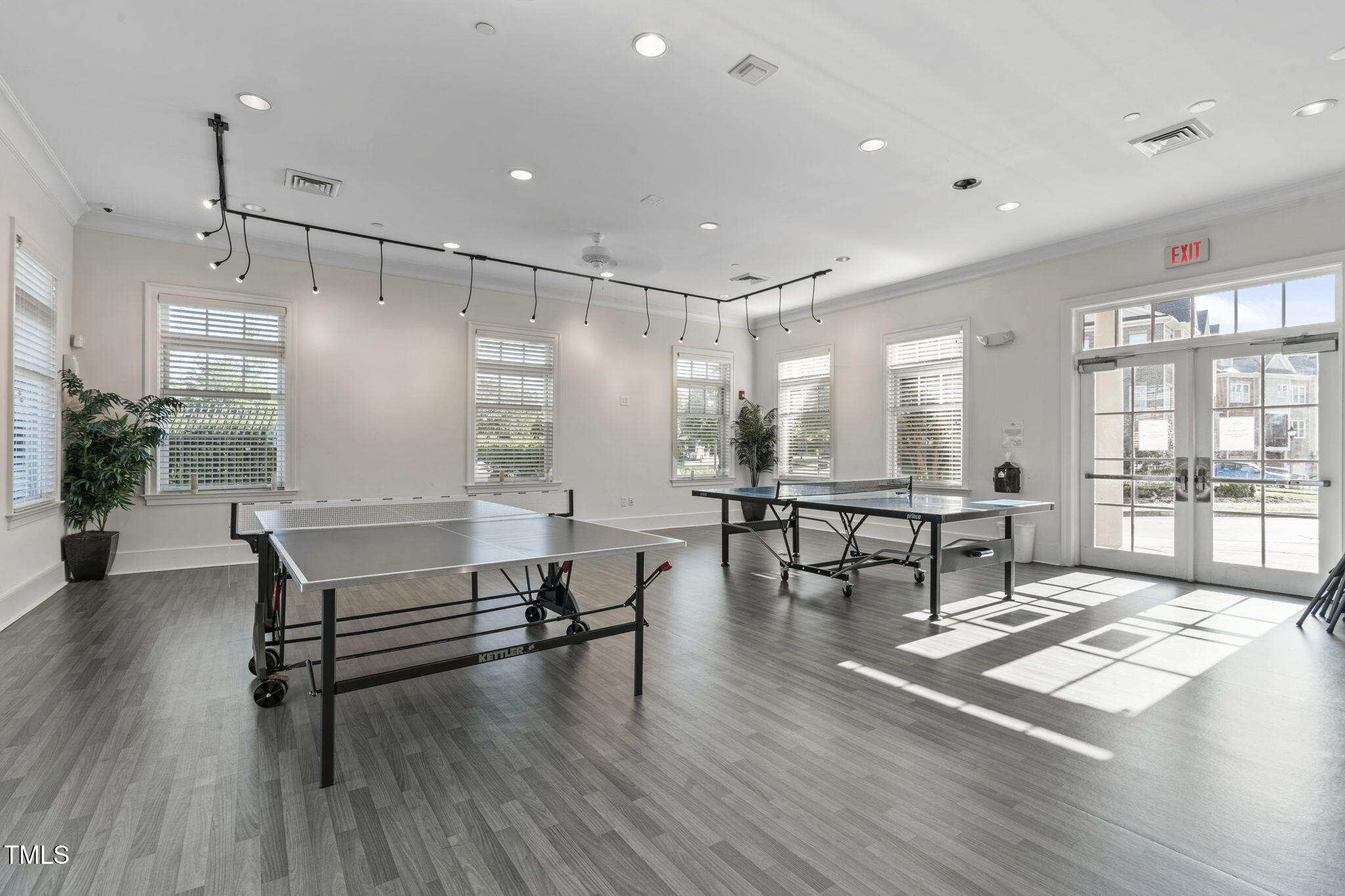 128 Arvind Oaks Circle Cary, NC 27519 - Photo 29 of 34 a living room with furniture a window and wooden floor