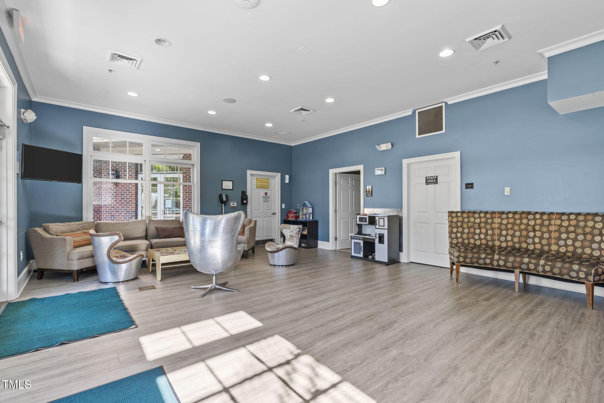 128 Arvind Oaks Circle Cary, NC 27519 - Photo 31 of 34 a living room with furniture rug and window