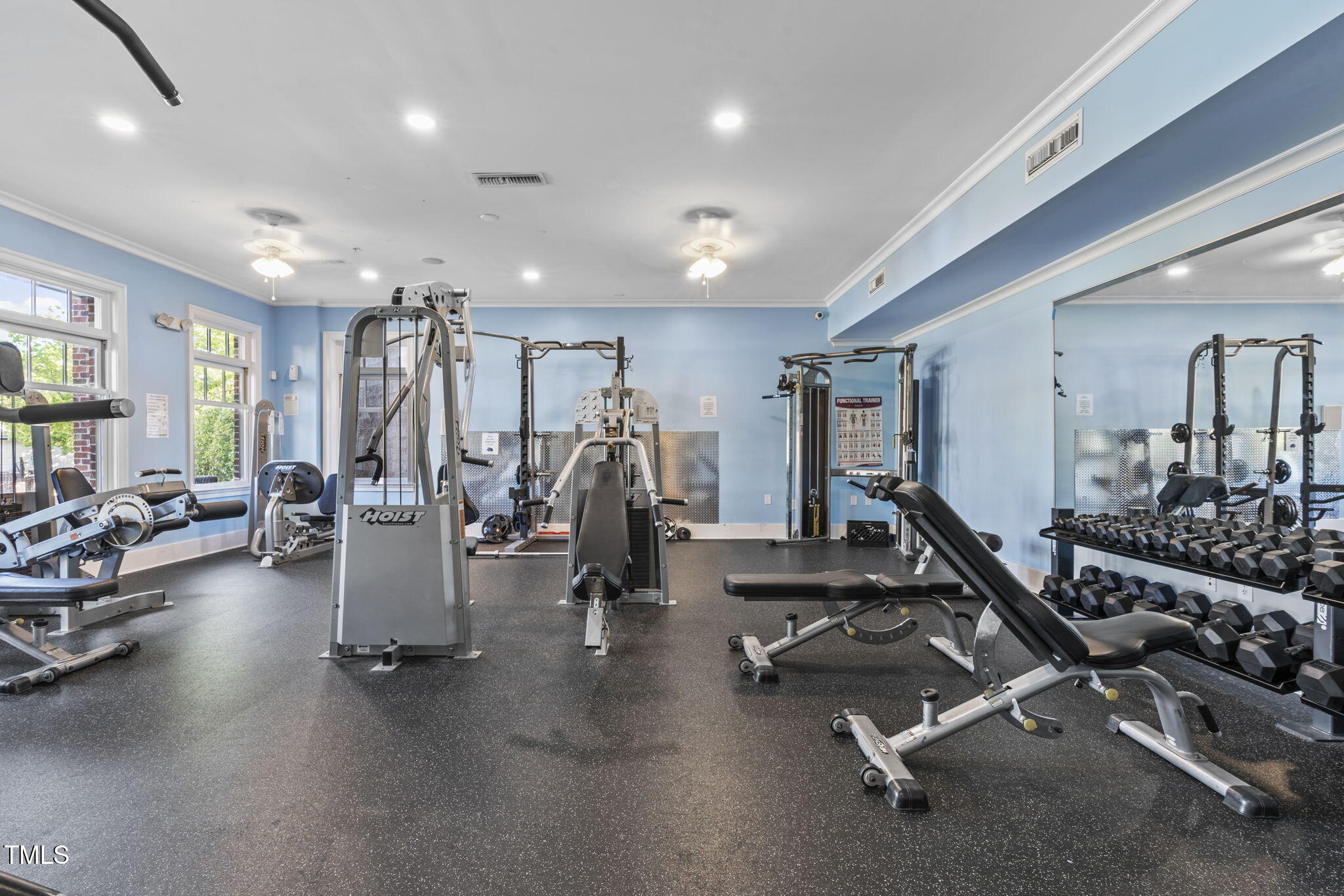 128 Arvind Oaks Circle Cary, NC 27519 - Photo 32 of 34 a view of a room with gym equipment