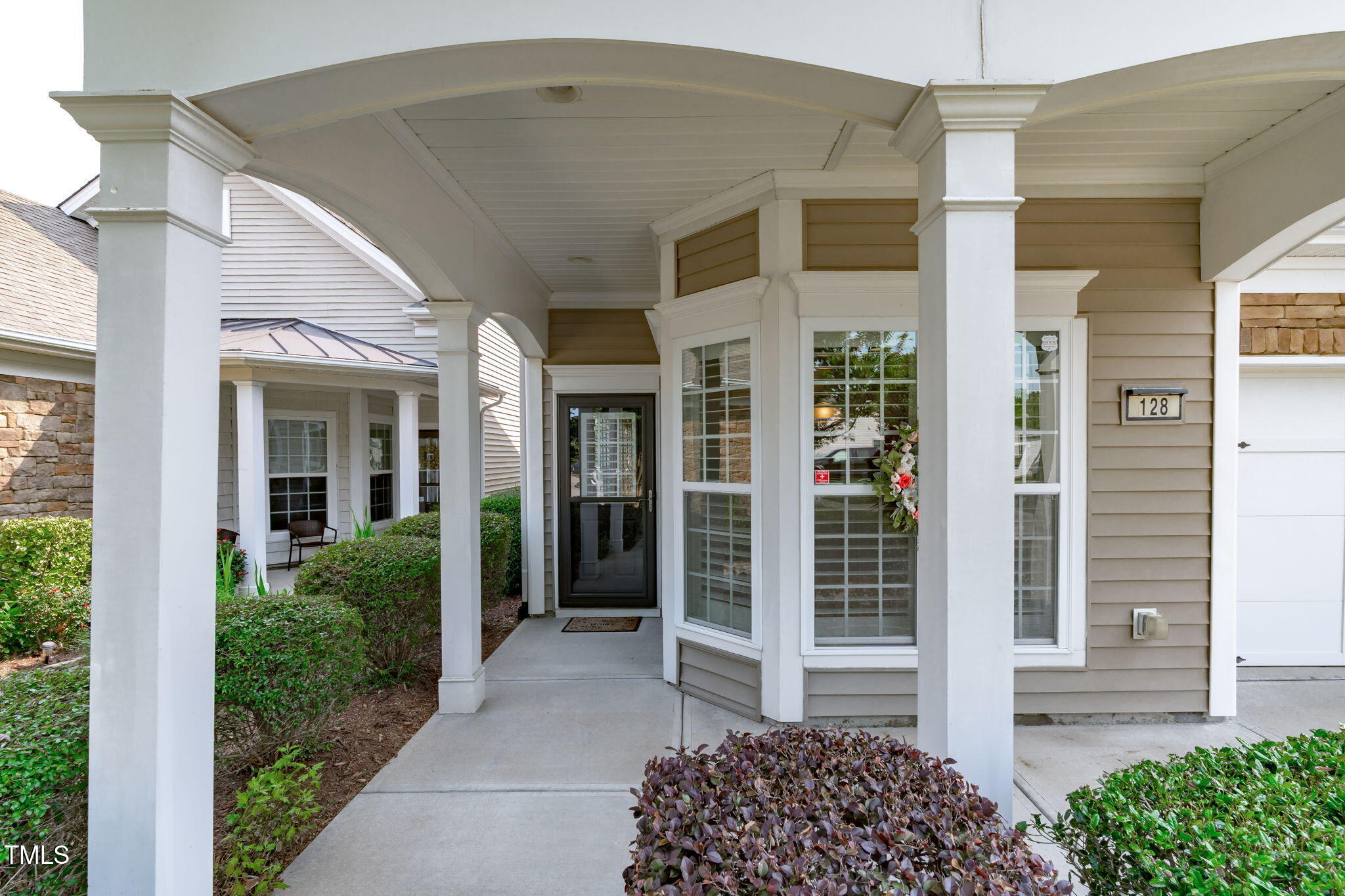 128 Arvind Oaks Circle Cary, NC 27519 - Photo 7 of 34 a house view with a outdoor space