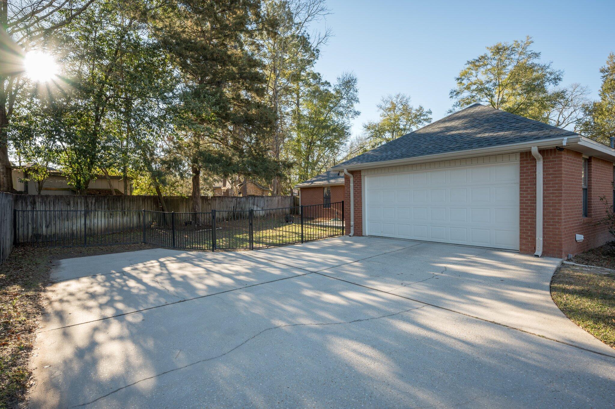 191 Adams Drive Crestview, FL 32536 - Photo 23 of 29 a view of back yard of the house