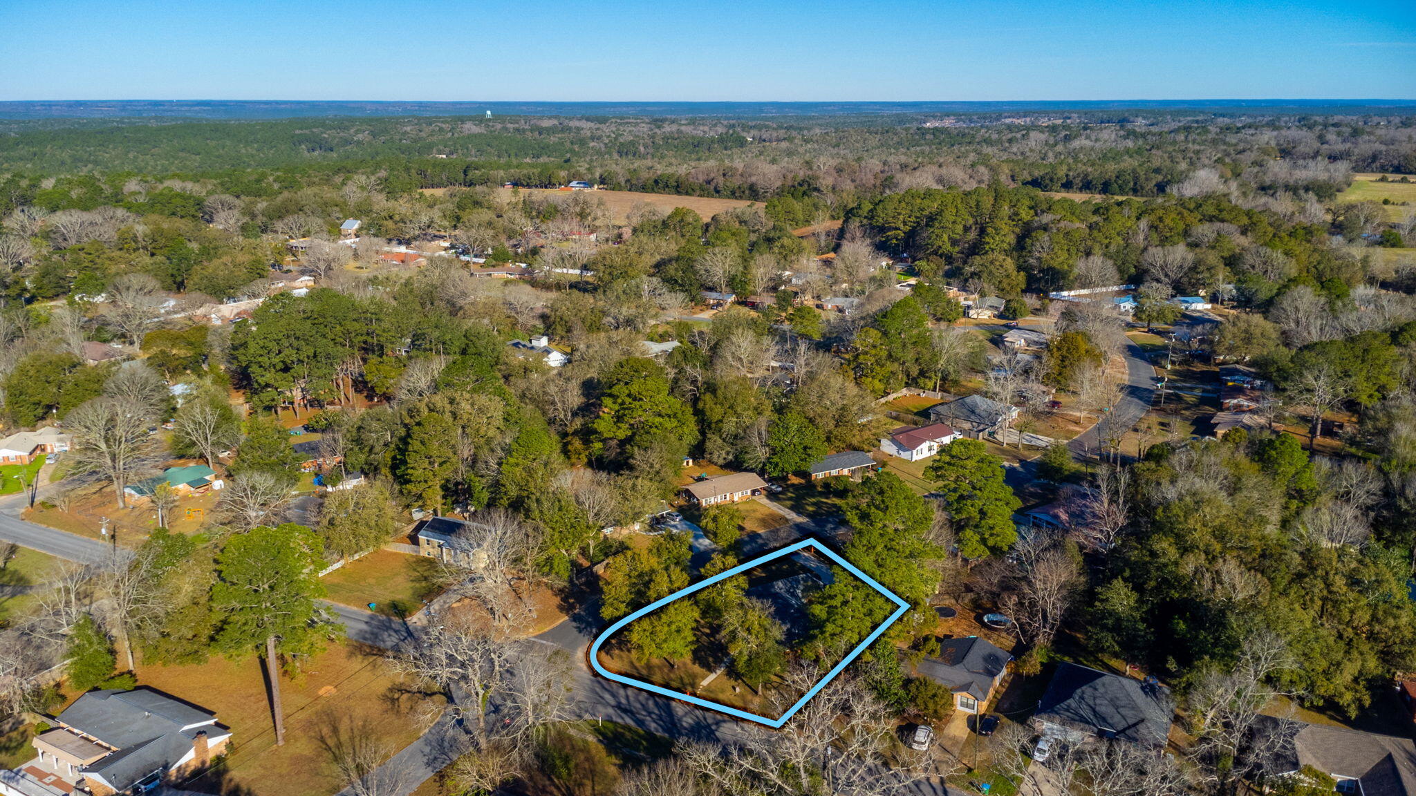 191 Adams Drive Crestview, FL 32536 - Photo 27 of 29 an aerial view of residential house with parking space and trees