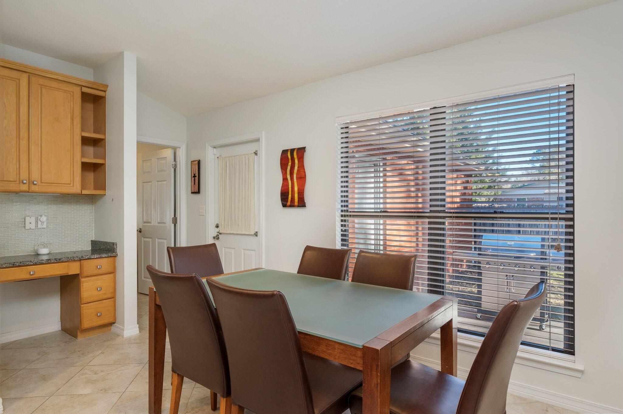 191 Adams Drive Crestview, FL 32536 - Photo 9 of 29 a view of a dining room with furniture and window