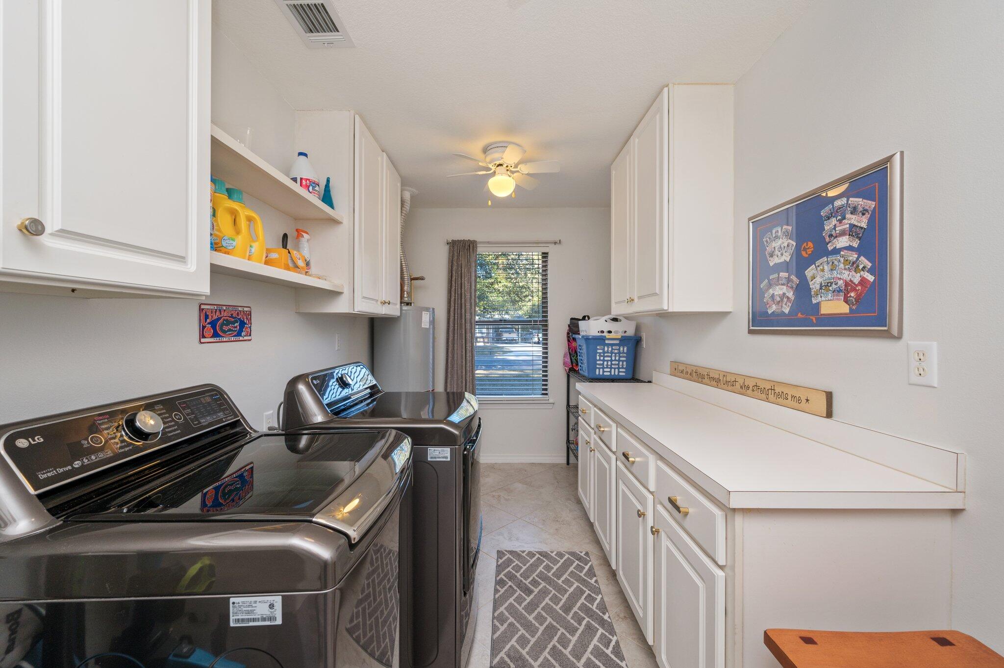 191 Adams Drive Crestview, FL 32536 - Photo 10 of 29 a kitchen that has a stove and a microwave